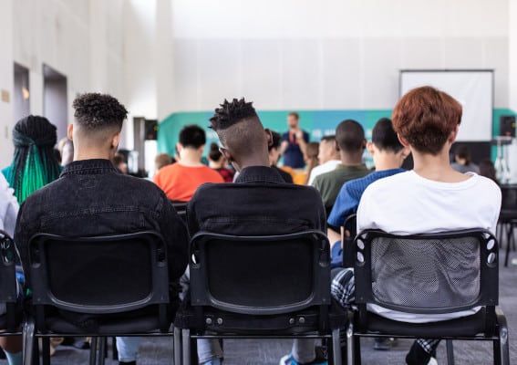 Highschool-aged students in a classroom