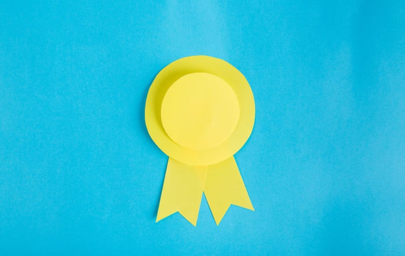 yellow ribbon on blue background